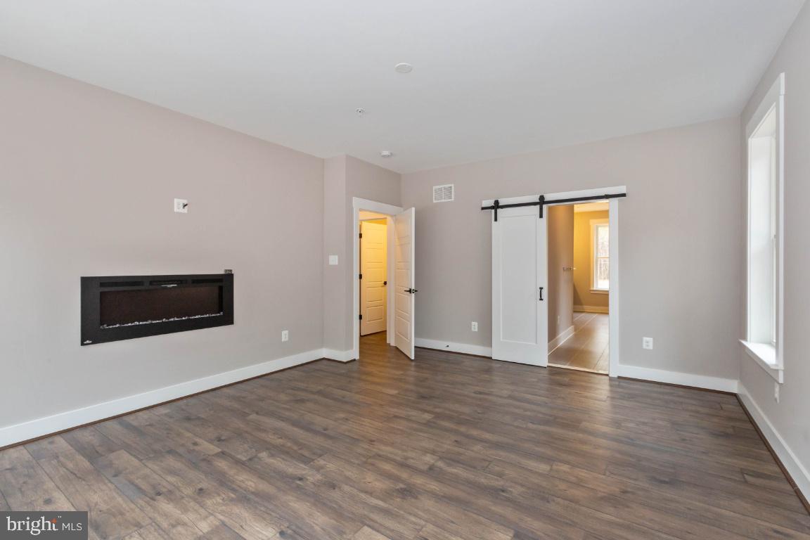 16905 Hughes Road Poolesville, MD 20837 - Photo 11 of 11 Custom fireplace in master bedroom
