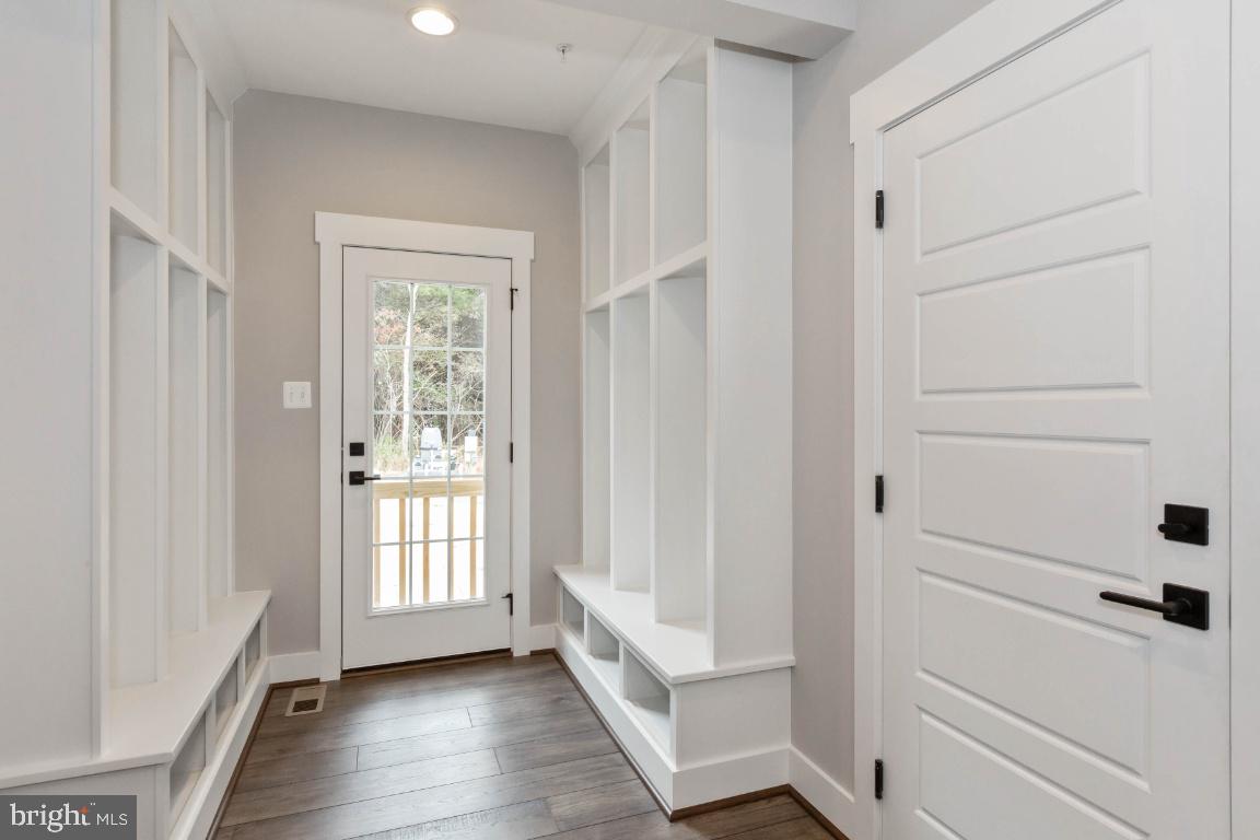 16905 Hughes Road Poolesville, MD 20837 - Photo 9 of 11 Custom doors and cubbies in mudroom