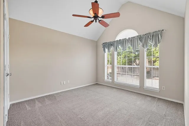 a bathroom with a toilet a sink and a mirror