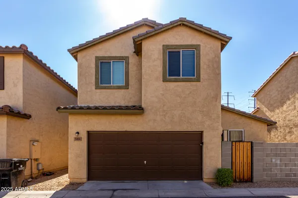 a view of front of house with garage