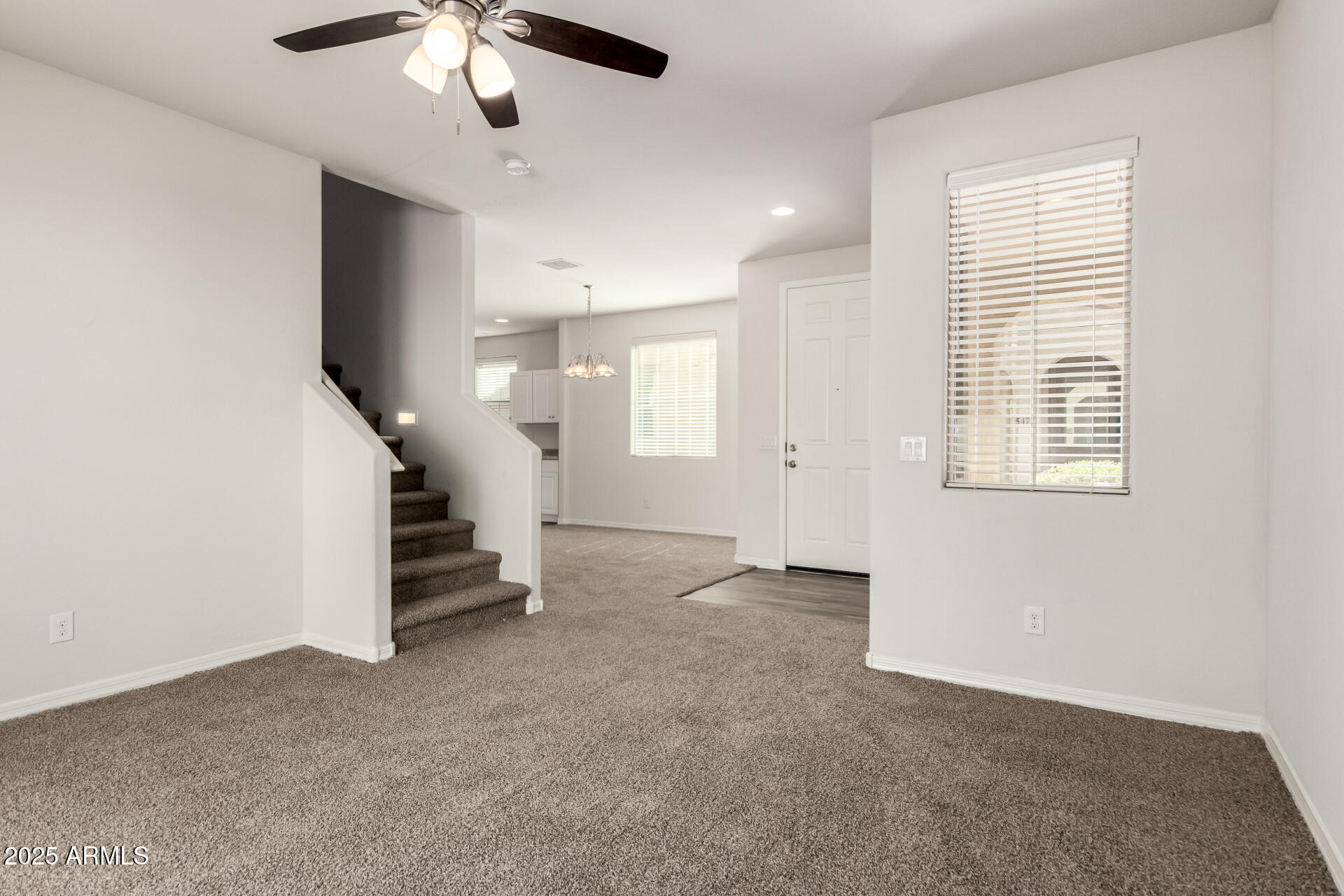 5464 Fulton Street Phoenix, AZ 85043 - Photo 12 of 31 en view interior of a house with stairs and a ceiling fan