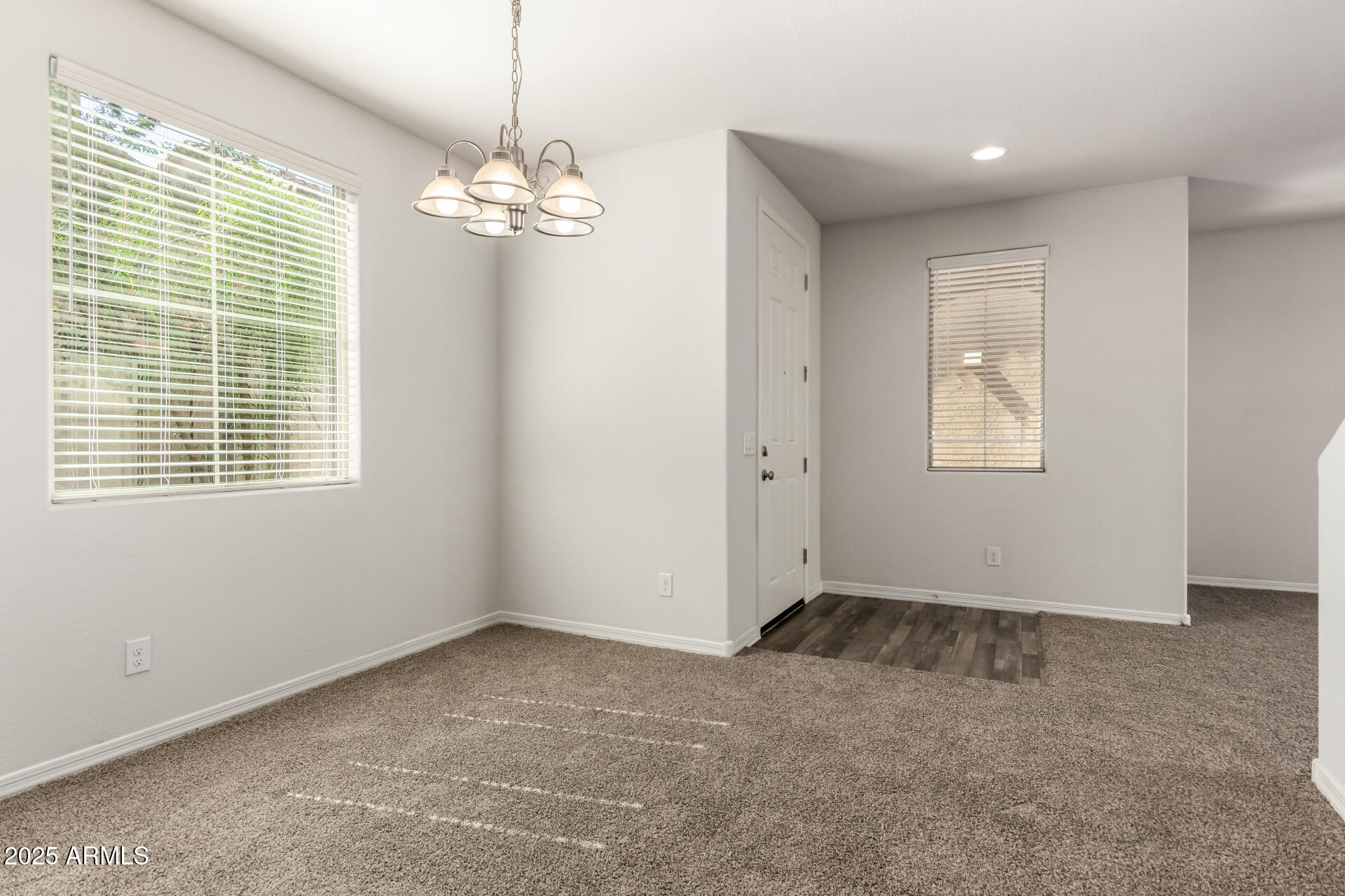 5464 Fulton Street Phoenix, AZ 85043 - Photo 13 of 31 a view of an empty room with a window