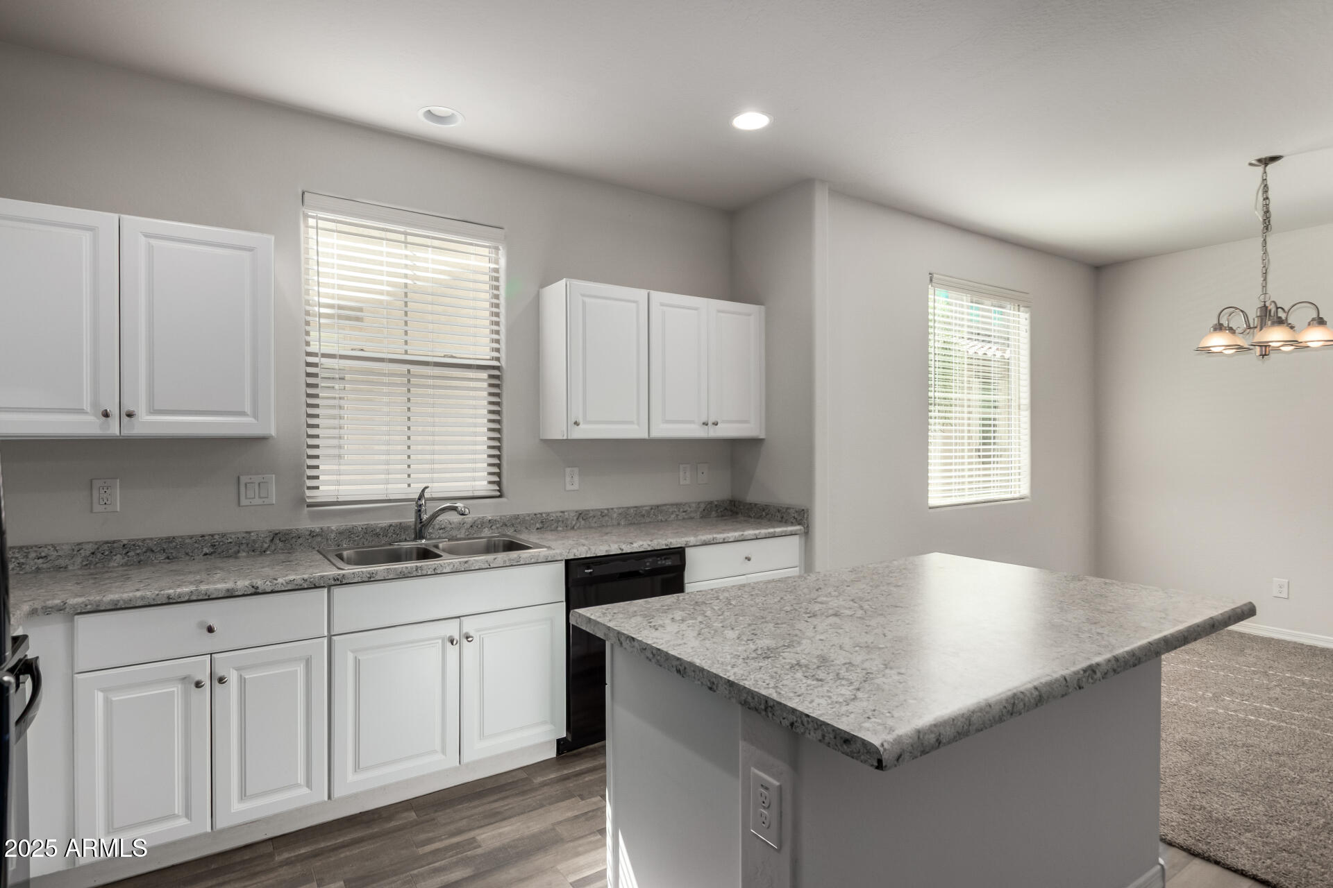5464 Fulton Street Phoenix, AZ 85043 - Photo 15 of 31 a kitchen with granite countertop white cabinets white appliances and a window