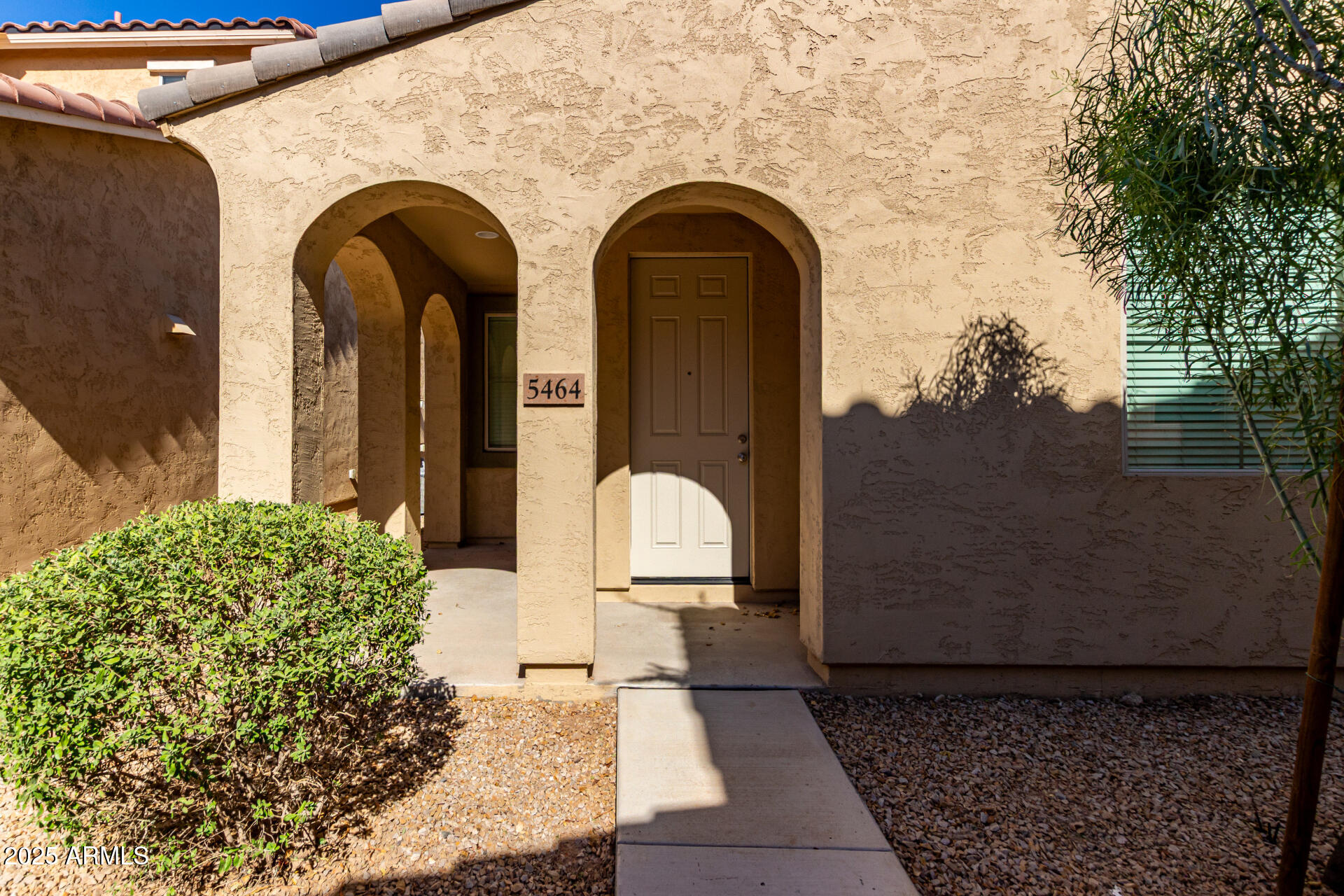 5464 Fulton Street Phoenix, AZ 85043 - Photo 8 of 31 a front view of a house with outdoor space