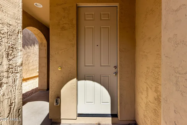 a view of cabinet with mirror