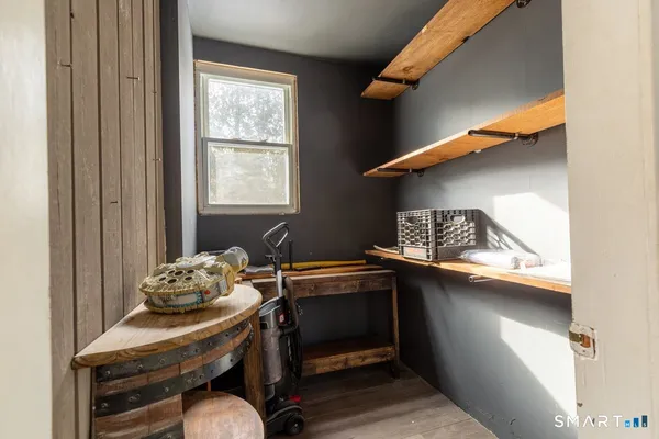 a room with a table and a window