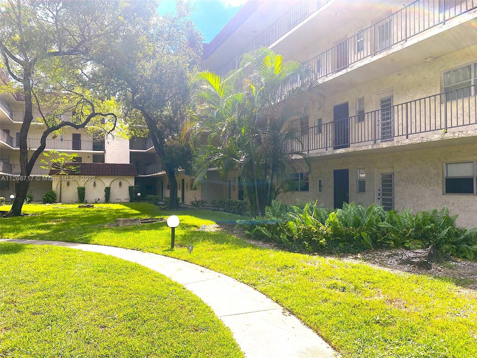 Inverrary Lauderhill, FL 33319 - Photo 2 of 9 a view of swimming pool with outdoor seating and yard