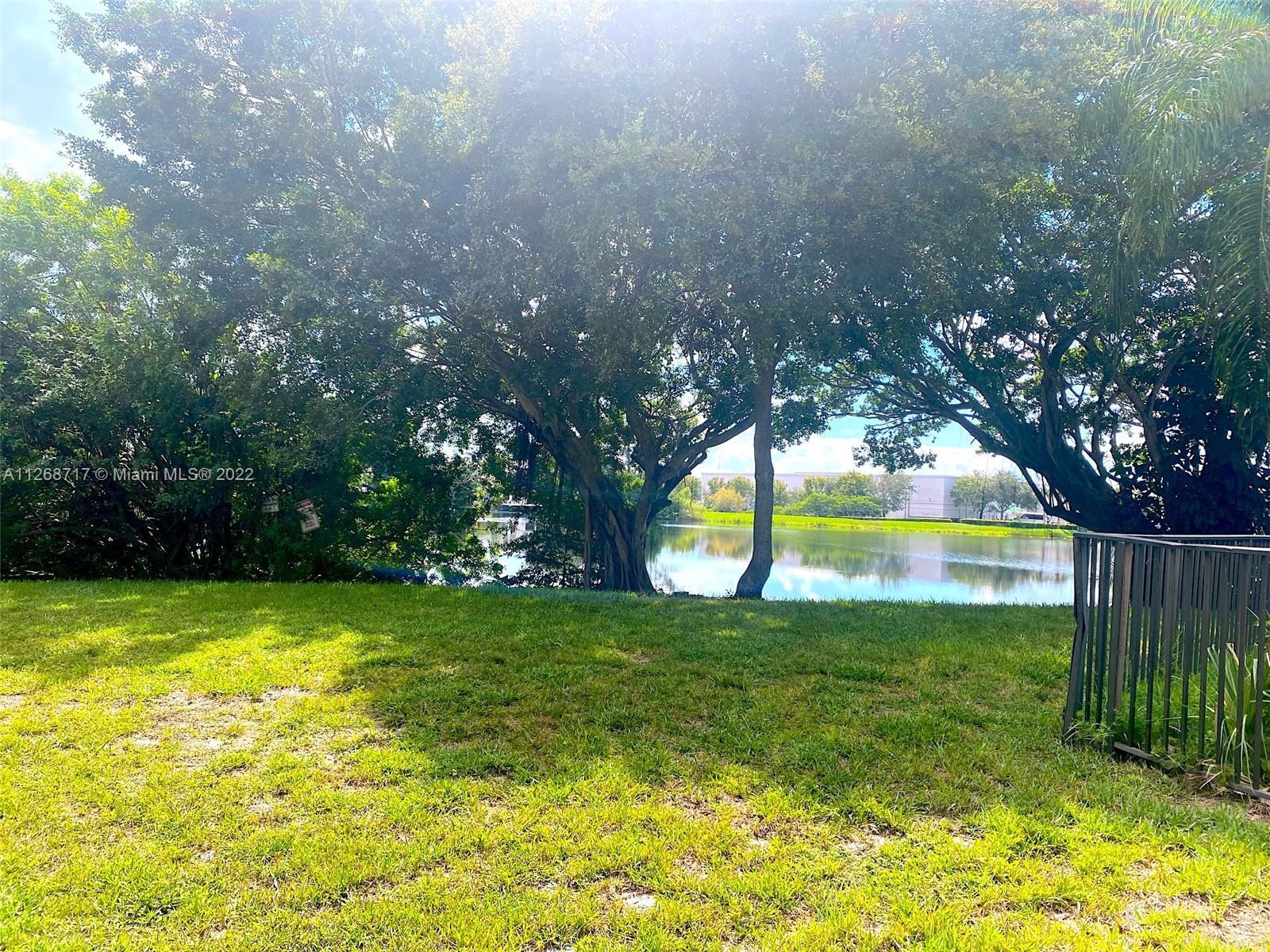 Inverrary Lauderhill, FL 33319 - Photo 4 of 9 a view of swimming pool with an outdoor space and seating area