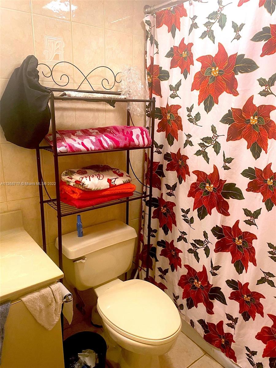 Inverrary Lauderhill, FL 33319 - Photo 9 of 9 a bathroom with a toilet and a sink