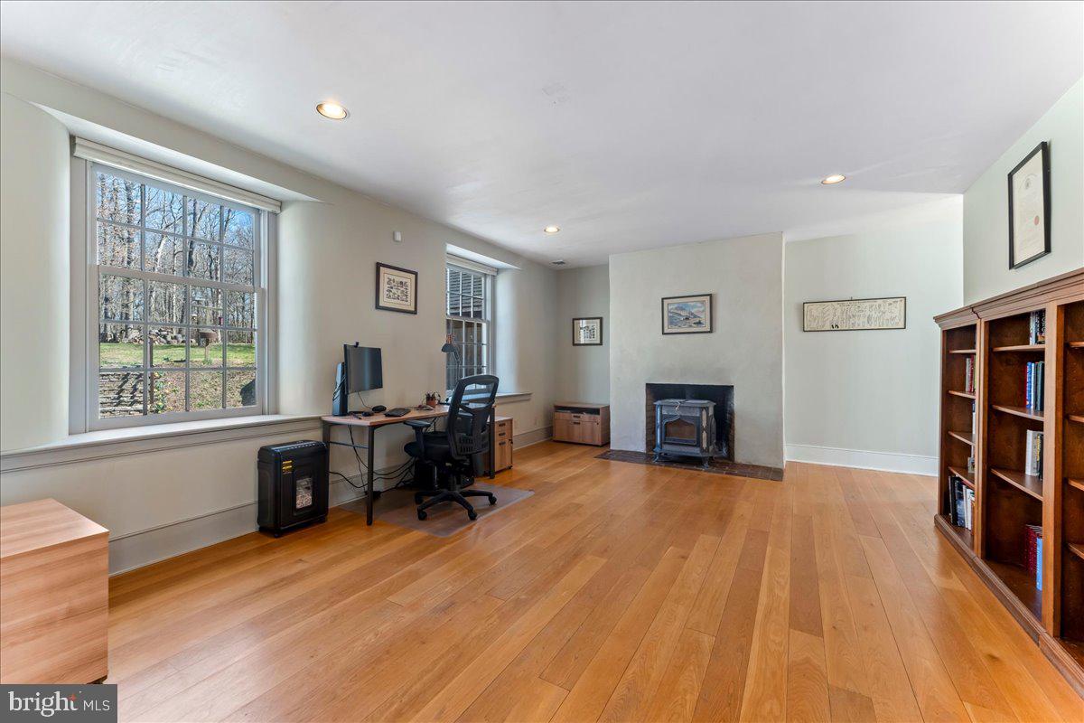 653 Scroggy Road Oxford, PA 19363 - Photo 18 of 81 a view of a livingroom with furniture and a fireplace
