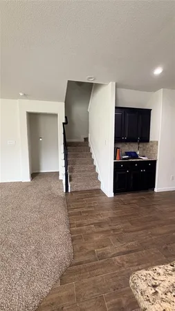 a view of a living room with a flat screen tv