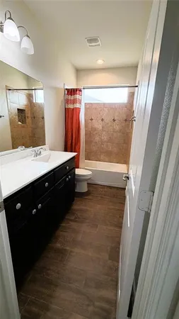 a view of a big room with wooden floor