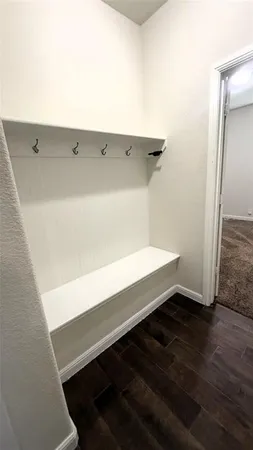 a view of a livingroom with a staircase