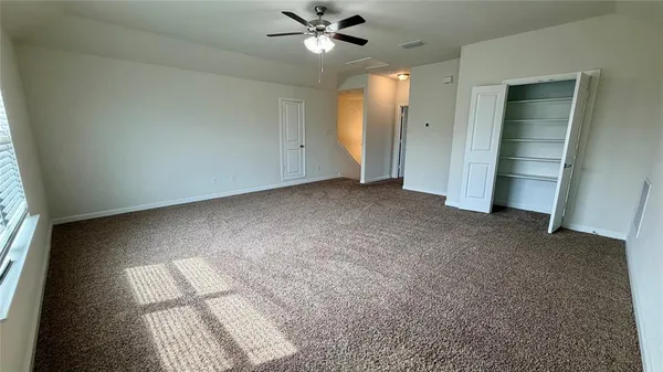 a view of a refrigerator in kitchen