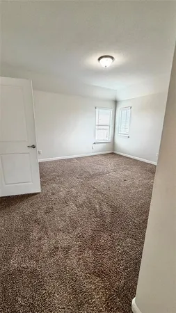 a bathroom with a double vanity sink toilet and shower