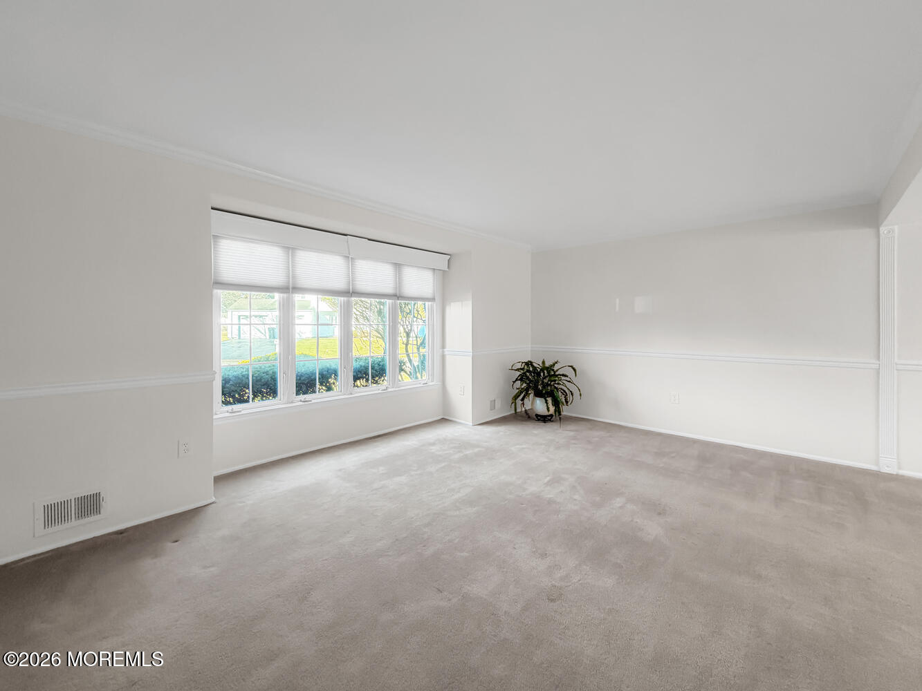 7 Meadow Court Hazlet, NJ 07730 - Photo 13 of 68 a view of an empty room with a window