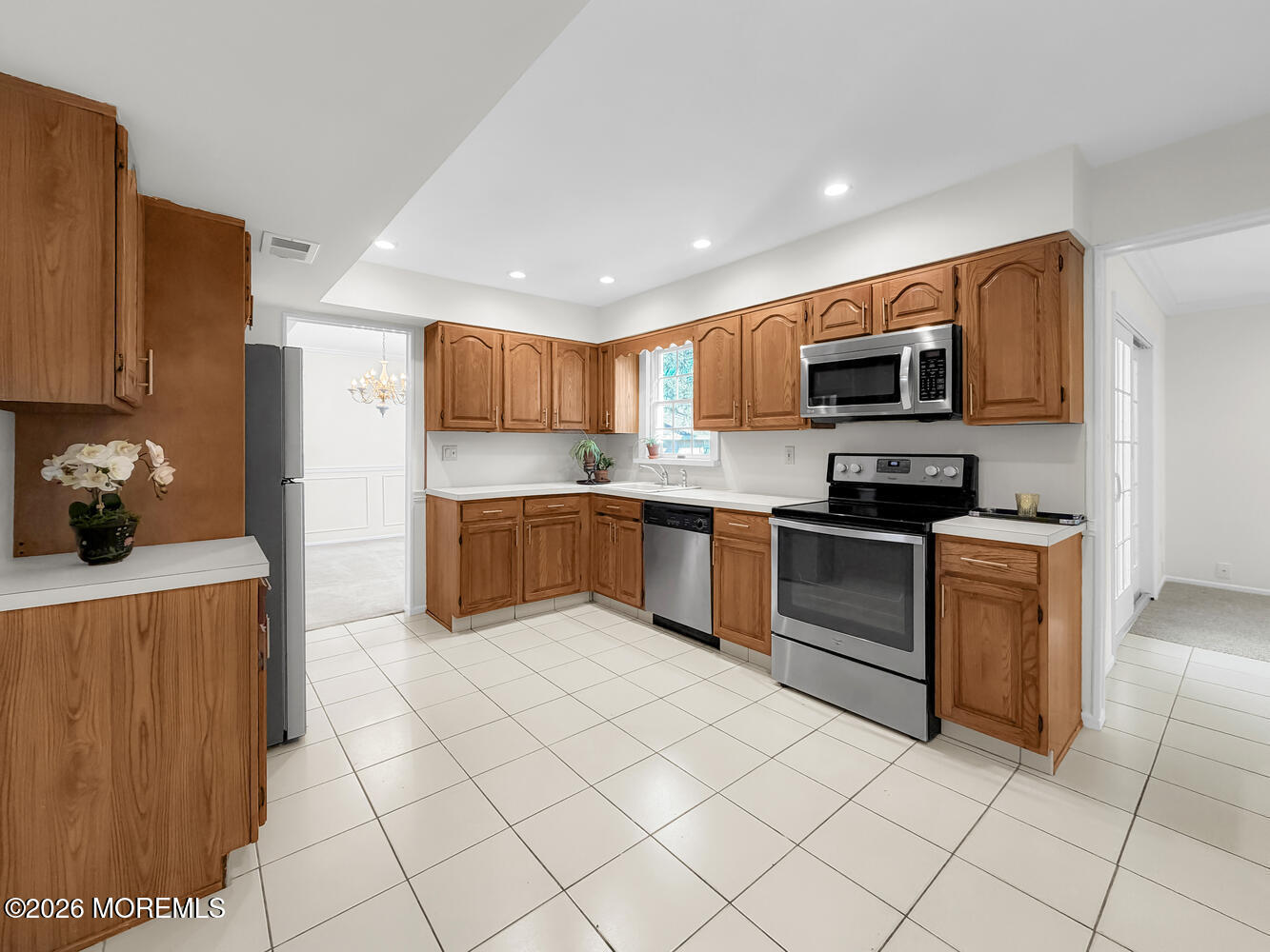 7 Meadow Court Hazlet, NJ 07730 - Photo 23 of 68 a kitchen with stainless steel appliances a stove sink and microwave