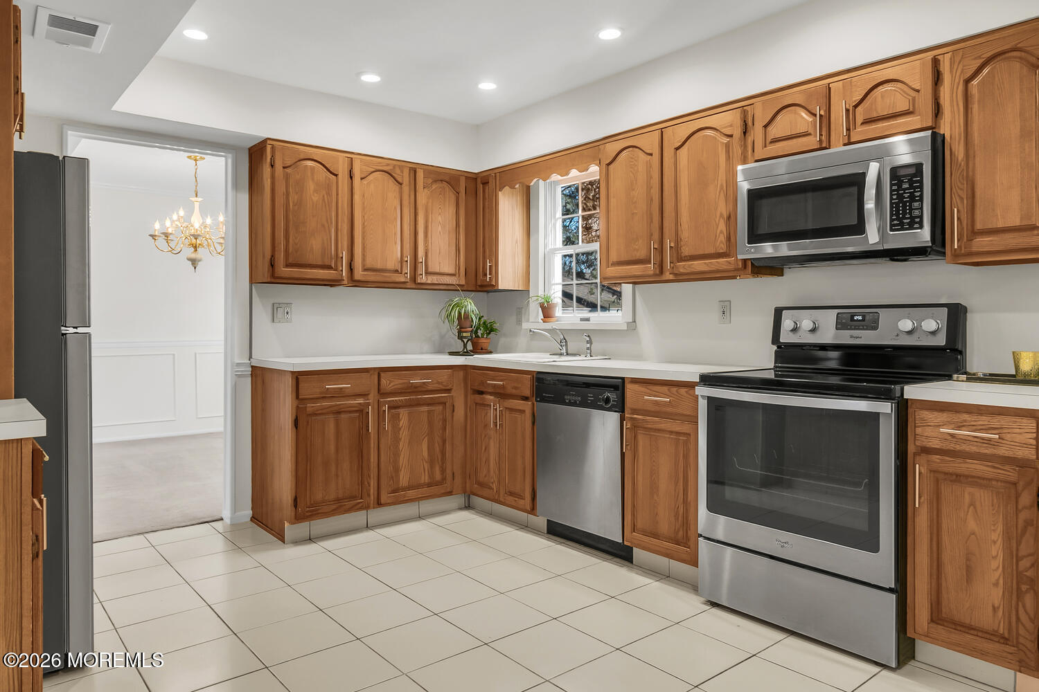7 Meadow Court Hazlet, NJ 07730 - Photo 24 of 68 a kitchen with stainless steel appliances granite countertop a refrigerator and a stove top oven