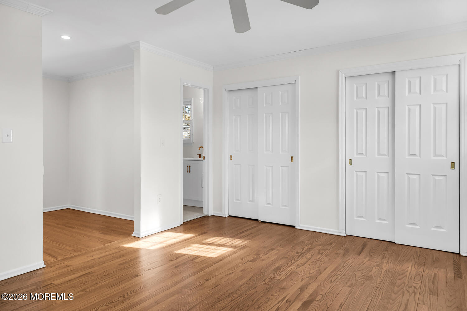 7 Meadow Court Hazlet, NJ 07730 - Photo 49 of 68 a view of empty room with wooden floor