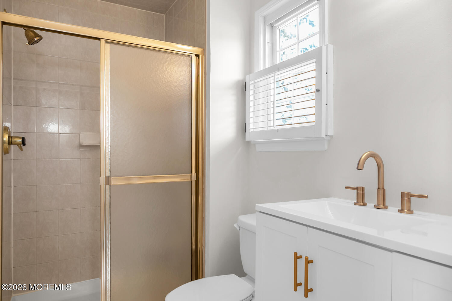 7 Meadow Court Hazlet, NJ 07730 - Photo 55 of 68 a bathroom with a sink mirror vanity and toilet