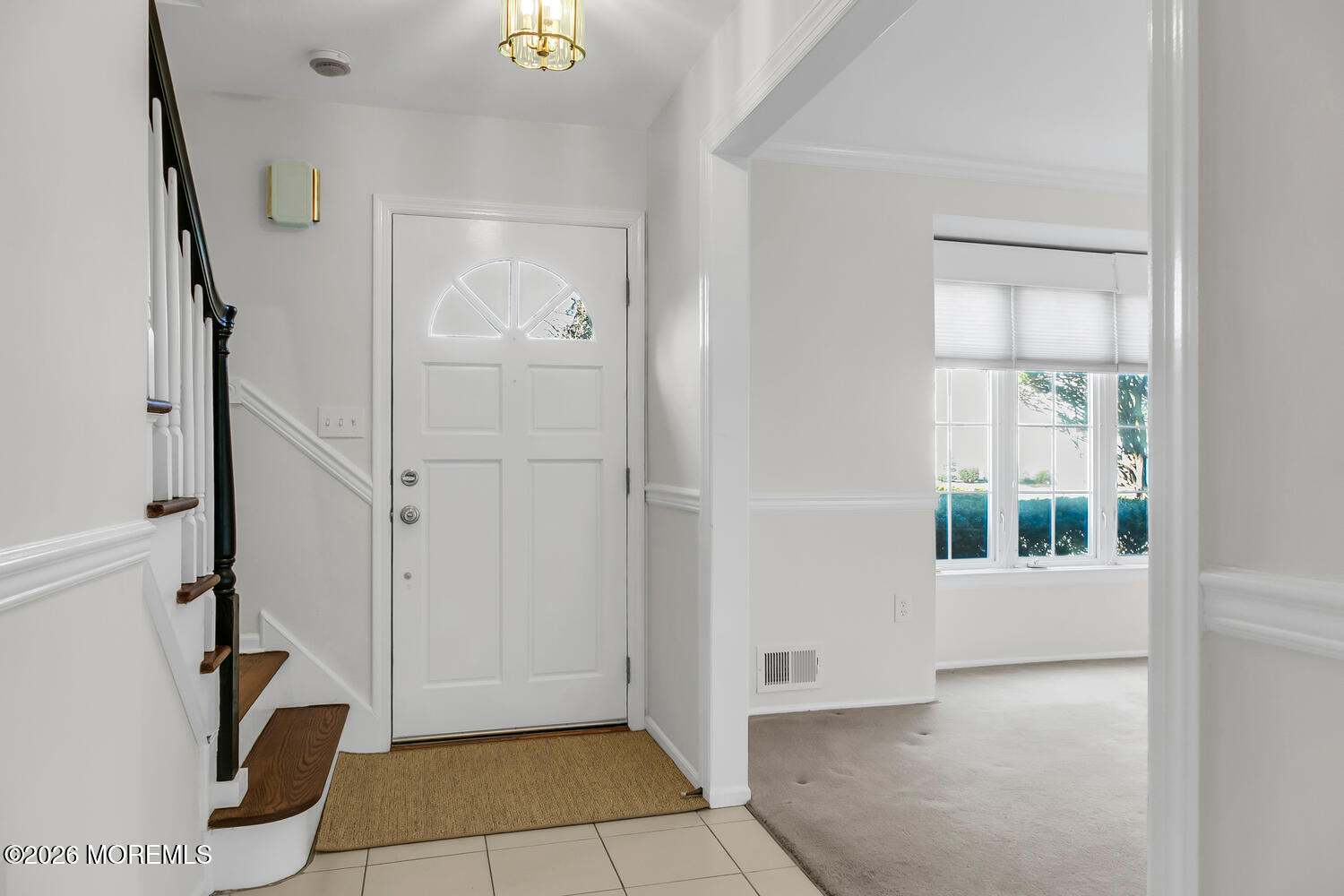 7 Meadow Court Hazlet, NJ 07730 - Photo 6 of 68 a view of an entryway with wooden floor and door