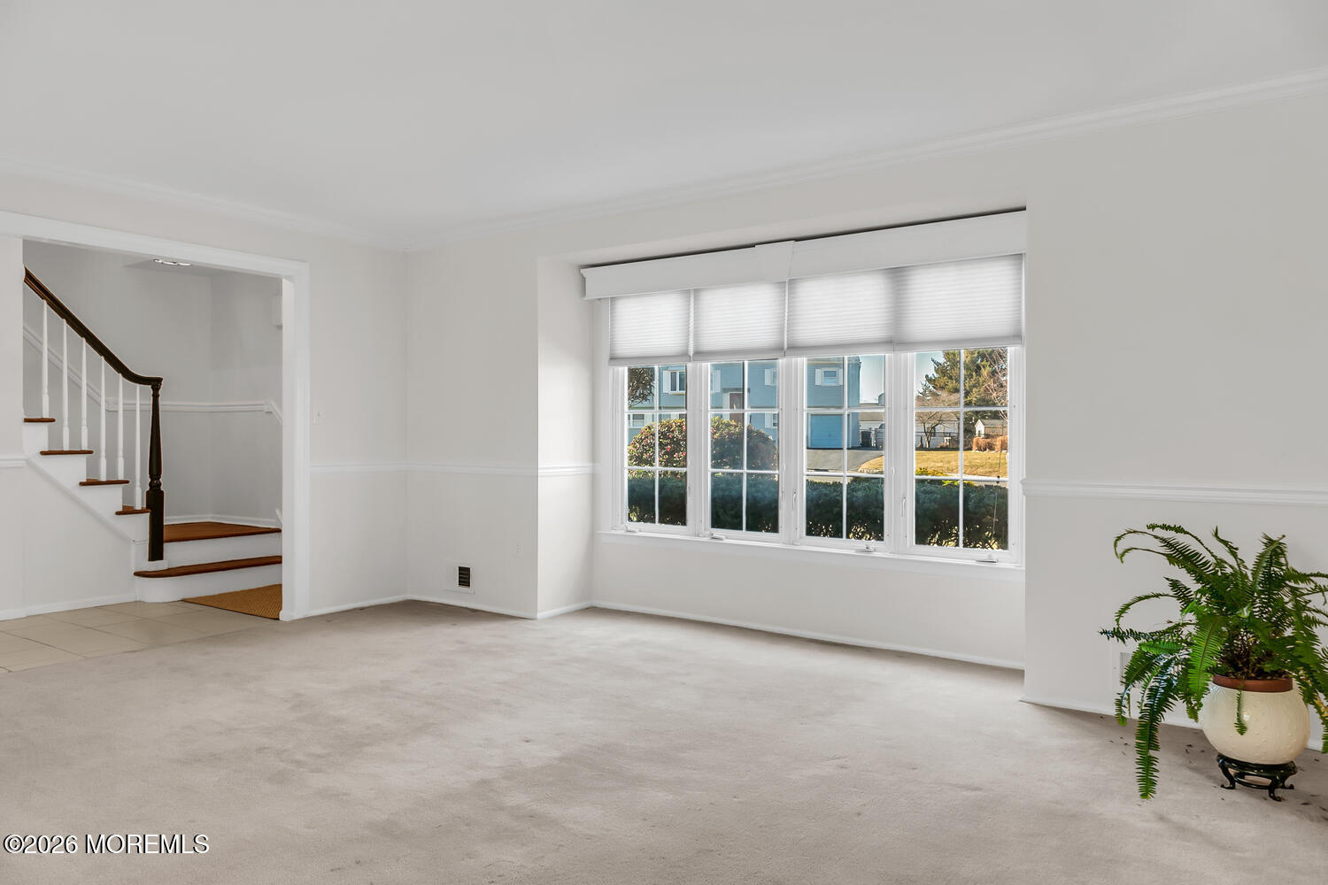 7 Meadow Court Hazlet, NJ 07730 - Photo 9 of 68 an empty room with windows and plants