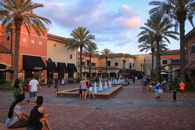 a view of a park with swings and slides