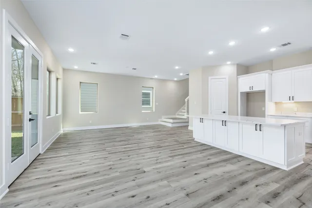 a view of kitchen with wooden floor