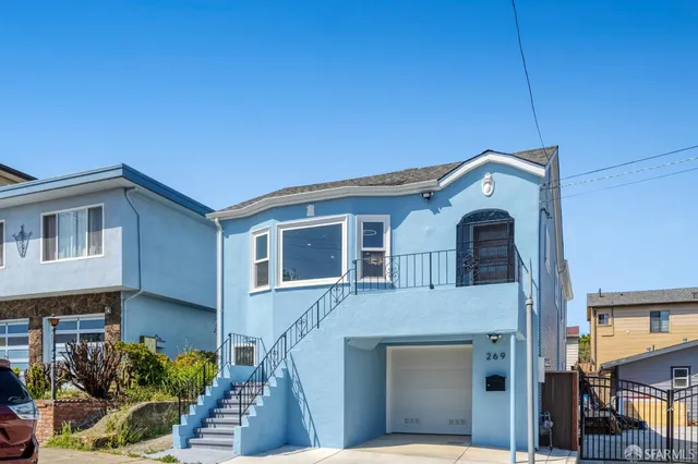 a view of a house with a balcony