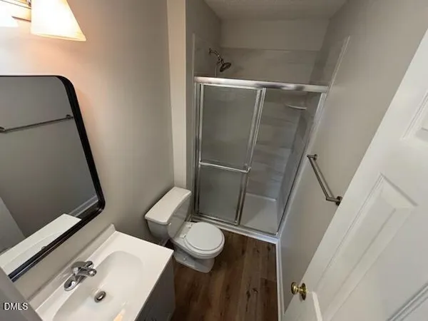 a bathroom with a sink and toilet