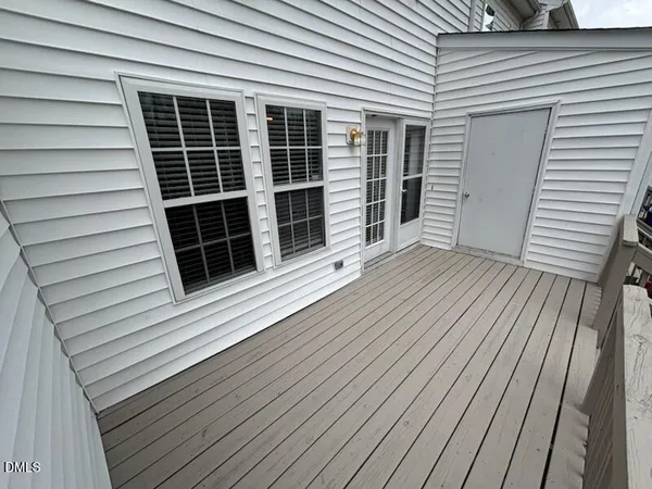a view of a house with a large window