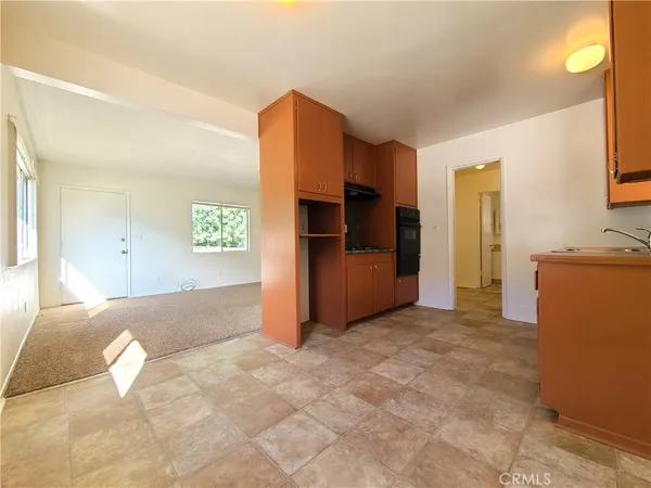 a view of livingroom with kitchen