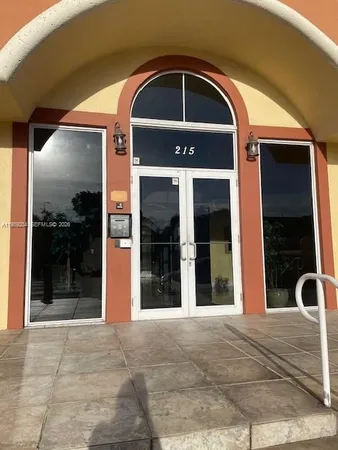 a view of entrance gate of a house
