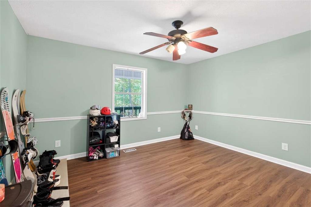 386 Ridgewood Drive Pendergrass, GA 30567 - Photo 20 of 50 a view of a room with gym equipment