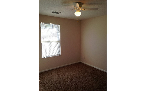 44206 Quail Ridge Avenue East Callahan, FL 32011 - Photo 11 of 15 a view of an empty room with a window