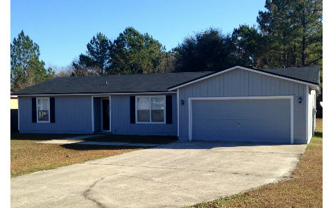 44206 Quail Ridge Avenue East Callahan, FL 32011 - Photo 15 of 15 a house with a yard