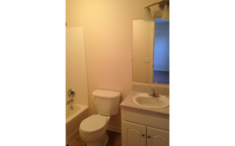 44206 Quail Ridge Avenue East Callahan, FL 32011 - Photo 8 of 15 a bathroom with a toilet and a sink