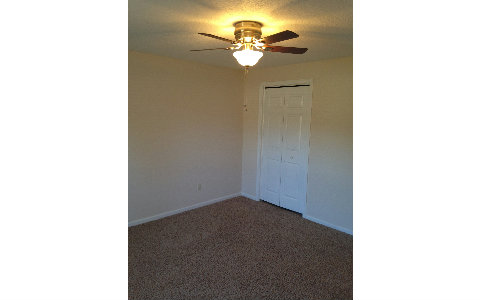 44206 Quail Ridge Avenue East Callahan, FL 32011 - Photo 9 of 15 a picture of a room with a ceiling fan