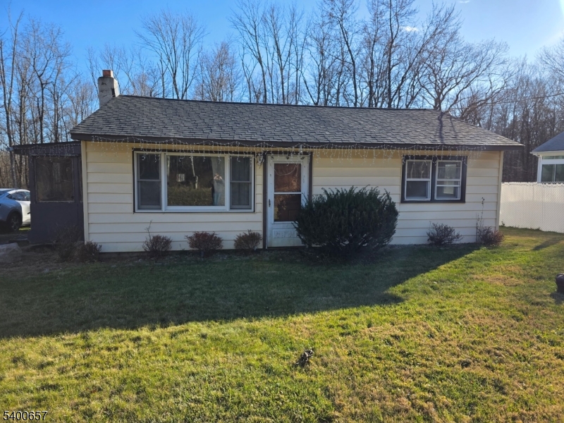 a view of a house with a garden