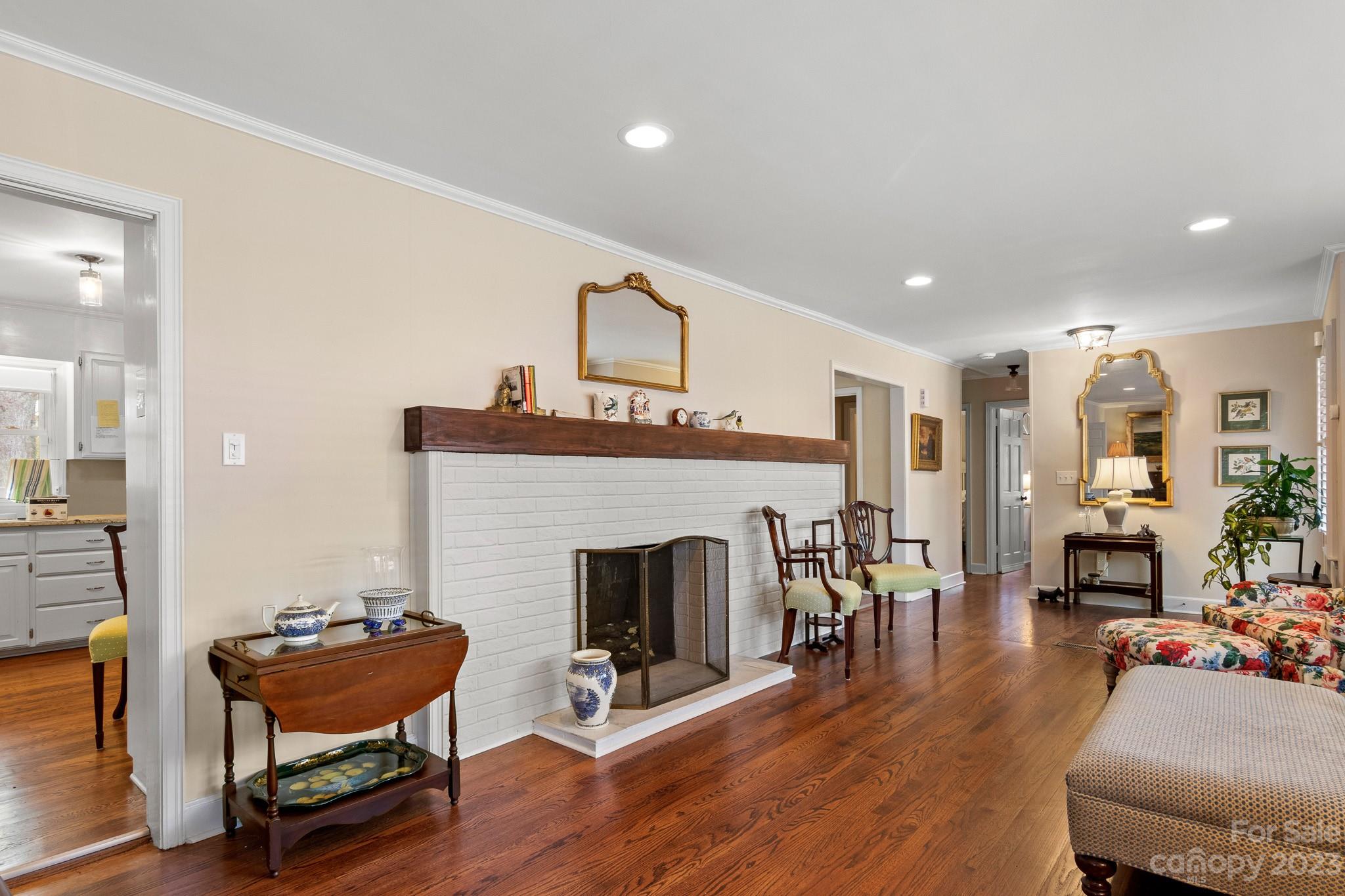 209 Country Club Road Shelby, NC 28150 - Photo 13 of 42 a living room with furniture and a fireplace