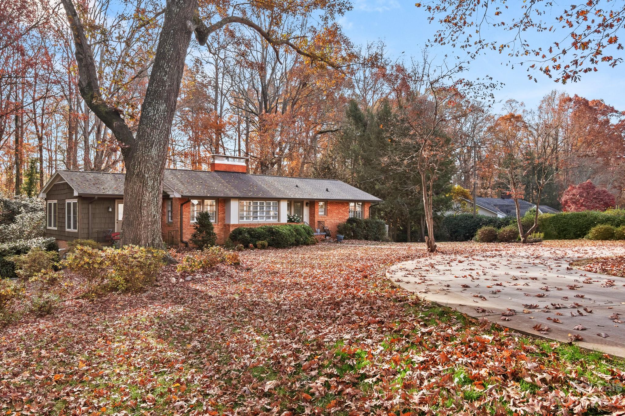 209 Country Club Road Shelby, NC 28150 - Photo 2 of 42 a front view of a house with a yard
