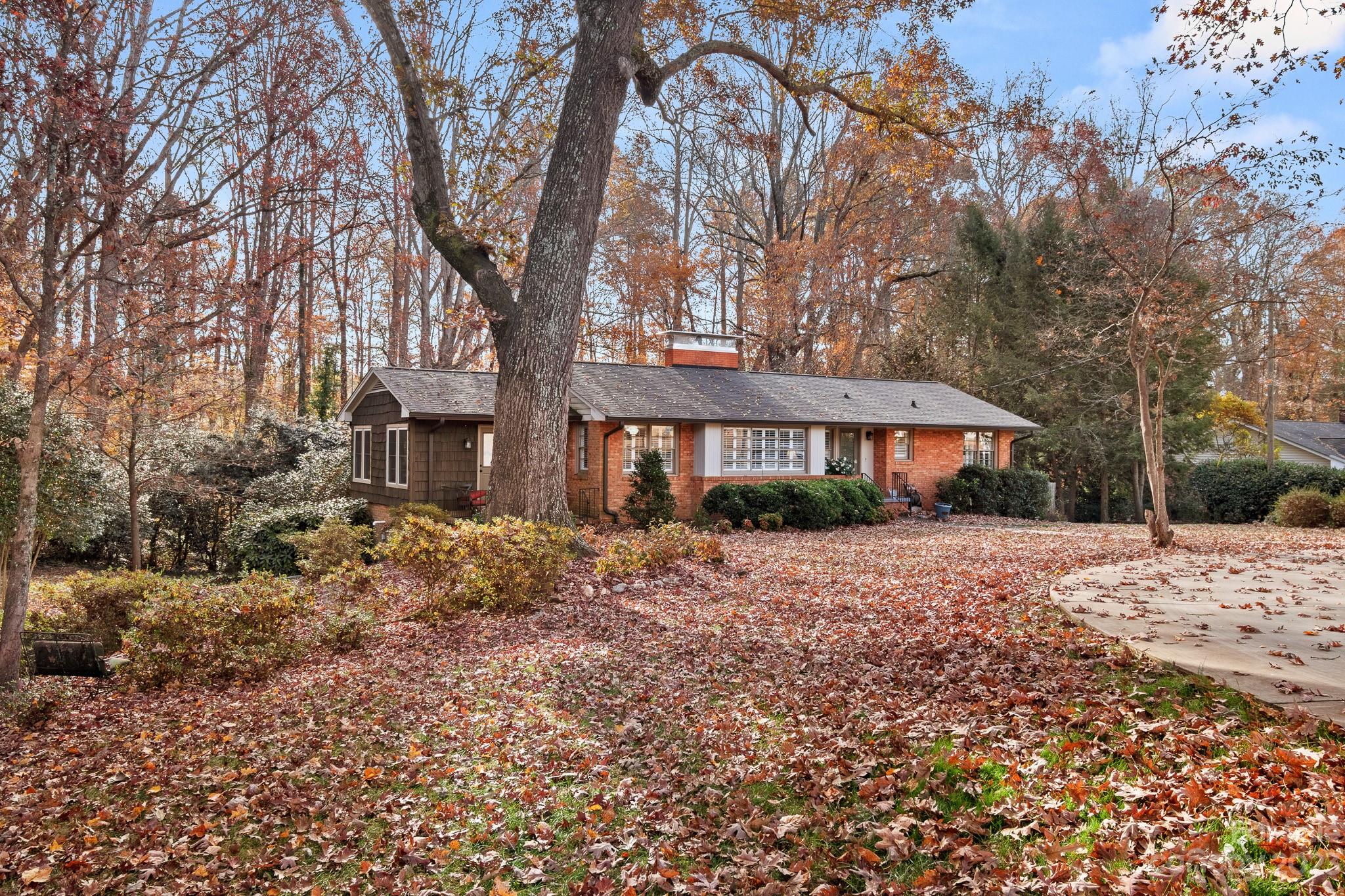 209 Country Club Road Shelby, NC 28150 - Photo 3 of 42 a front view of a house with a yard