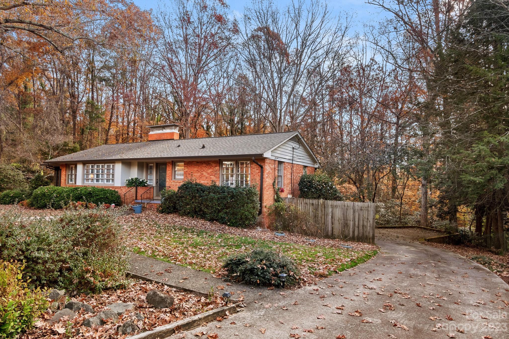 209 Country Club Road Shelby, NC 28150 - Photo 4 of 42 a front view of a house with a yard and pathway