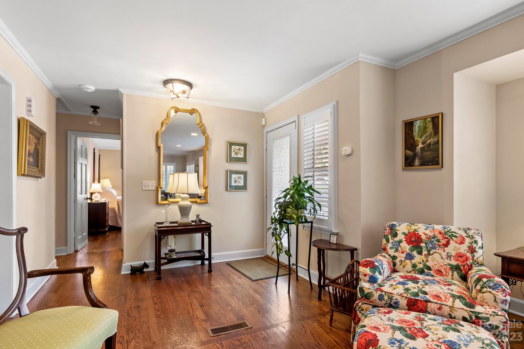 209 Country Club Road Shelby, NC 28150 - Photo 9 of 42 a view of a livingroom with furniture and a potted plant