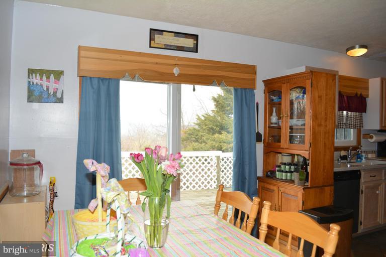 116 Rambo Court Linden, VA 22642 - Photo 18 of 30 a living room filled with furniture and a large window