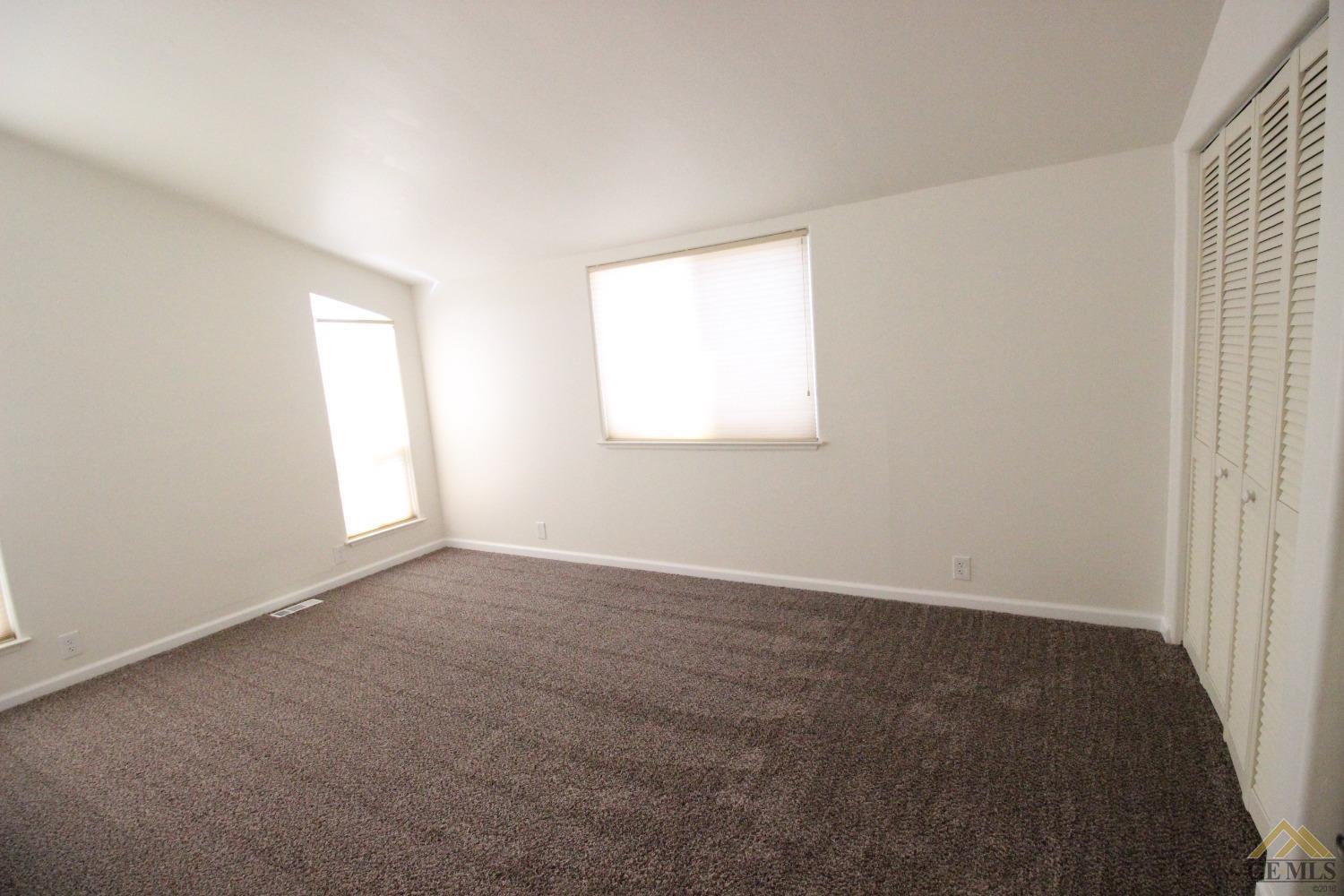 Undisclosed Address Bakersfield, CA 93308 - Photo 15 of 26 an empty room with a window