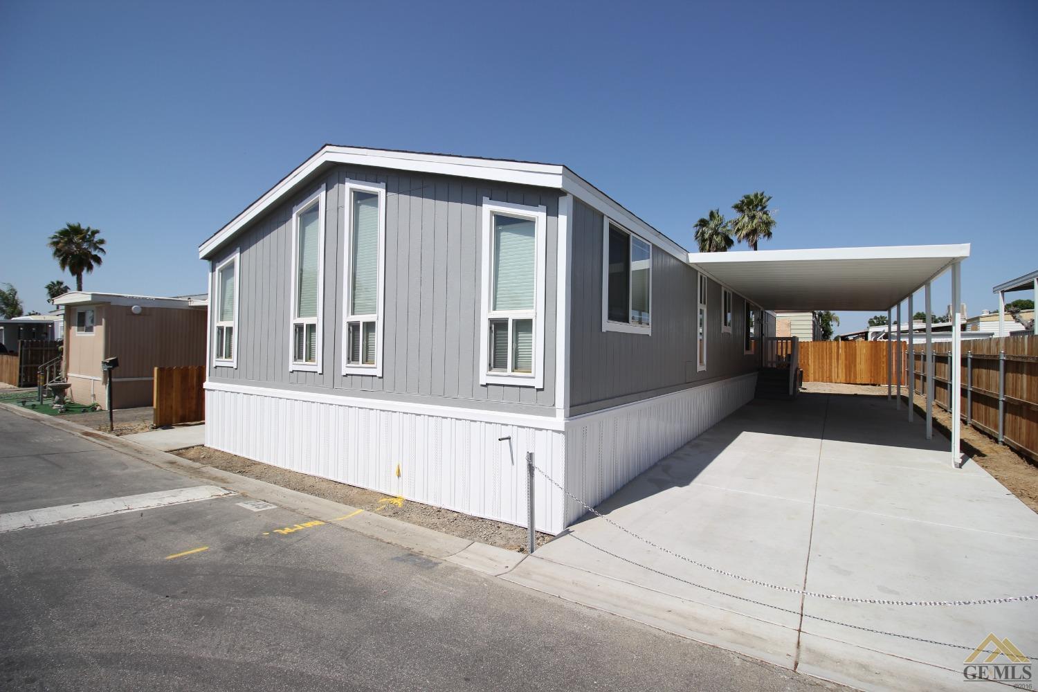 Undisclosed Address Bakersfield, CA 93308 - Photo 2 of 26 a view of a house with a patio