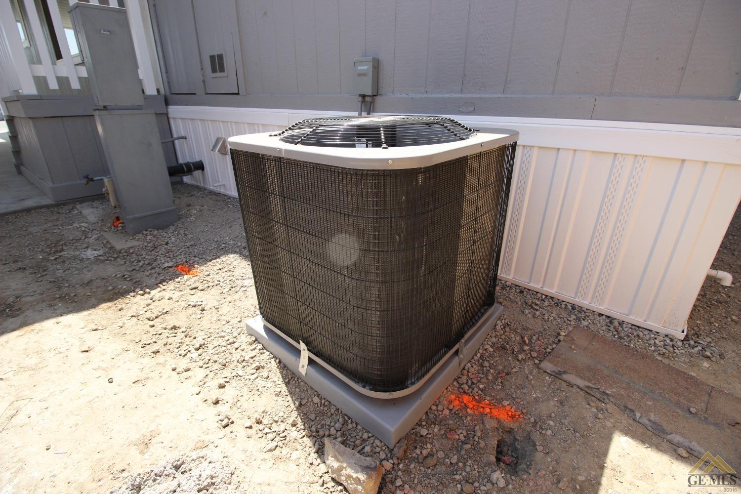 Undisclosed Address Bakersfield, CA 93308 - Photo 4 of 26 a room with a fireplace