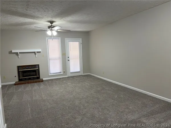 a white toilet sitting next to a shower