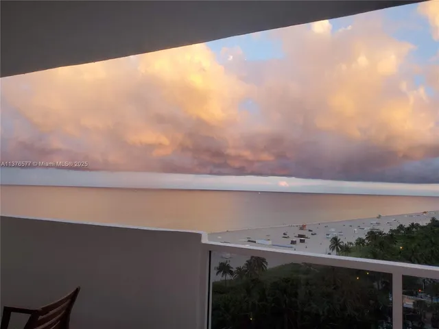 a view of a two chair in the balcony